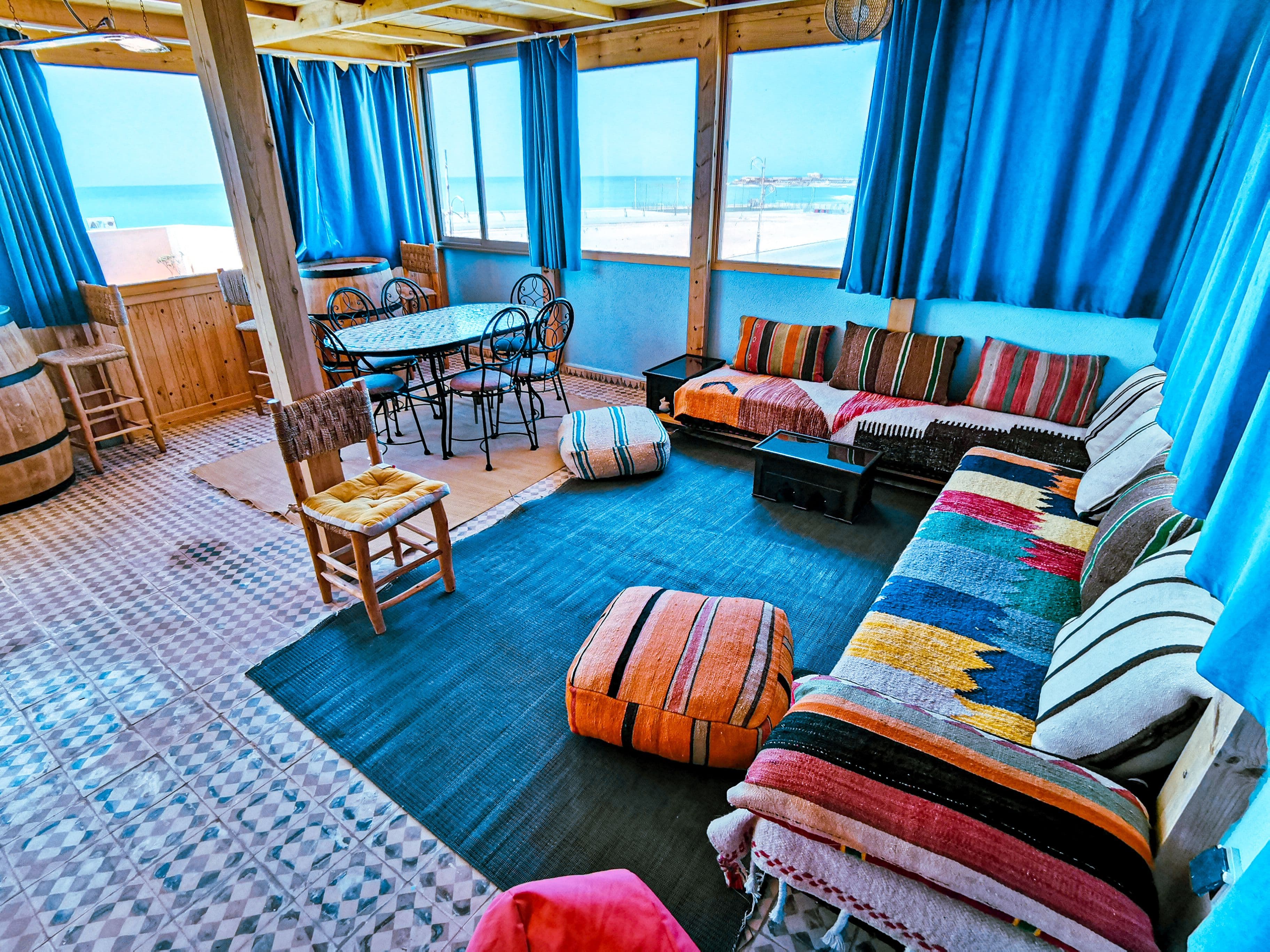 Lounge area with ocean view and colorful cushions