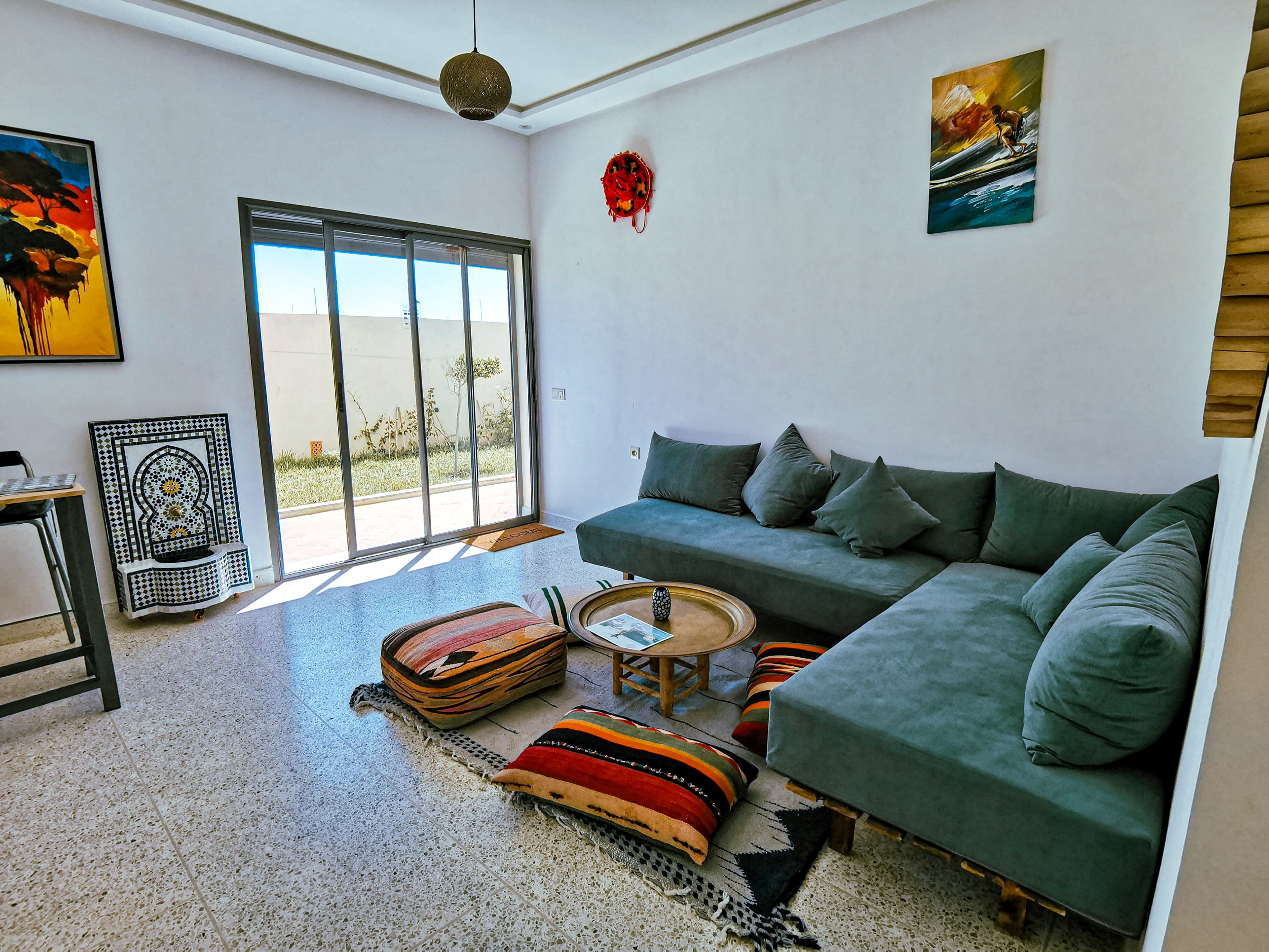 Bright living room with sectional sofa and garden view
