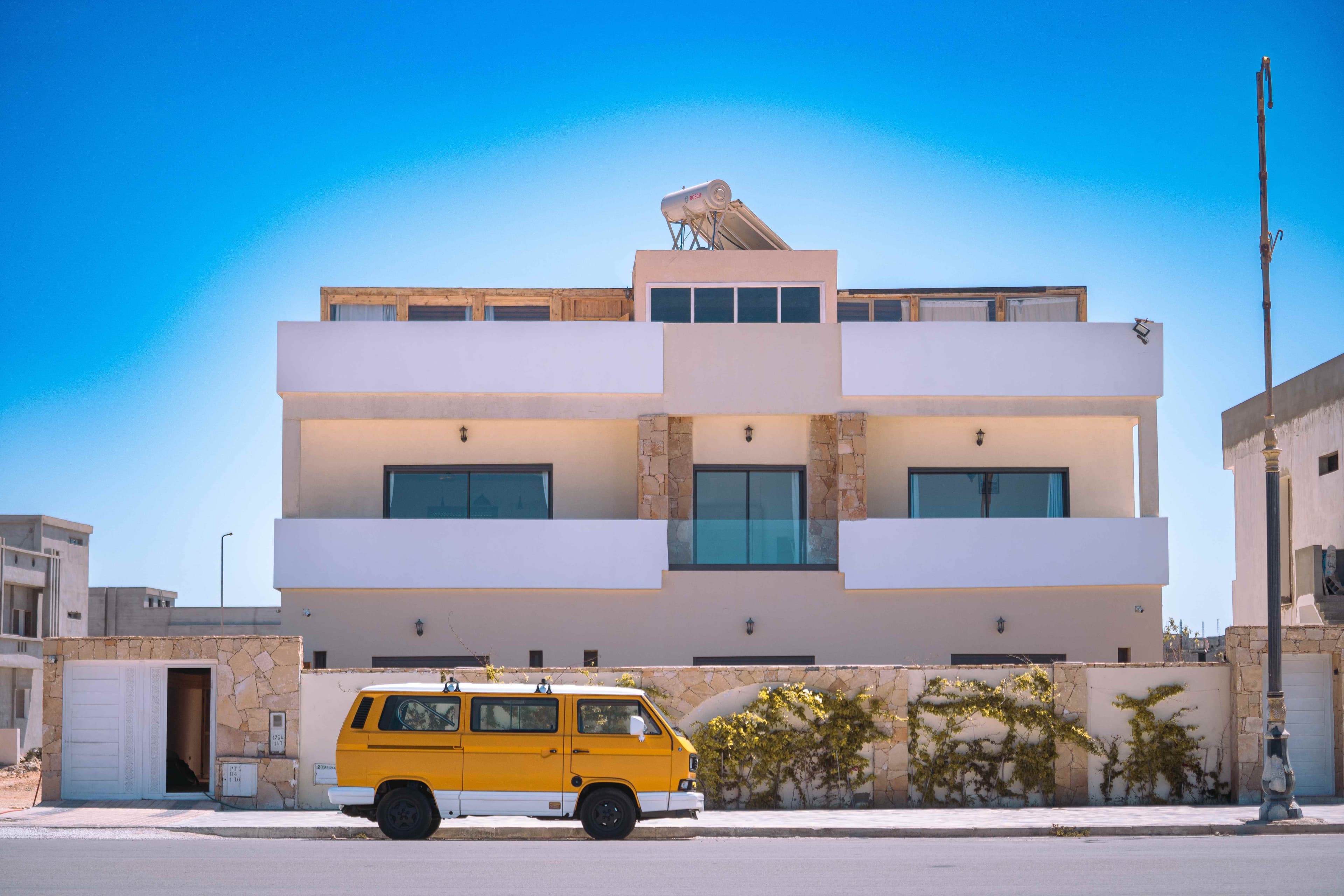 Exterior of Ocean Villa Dakhla with yellow van